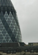 30 St Mary Axe, also known as the Swiss Re Building, 591 feet high and shaped like a pickle.